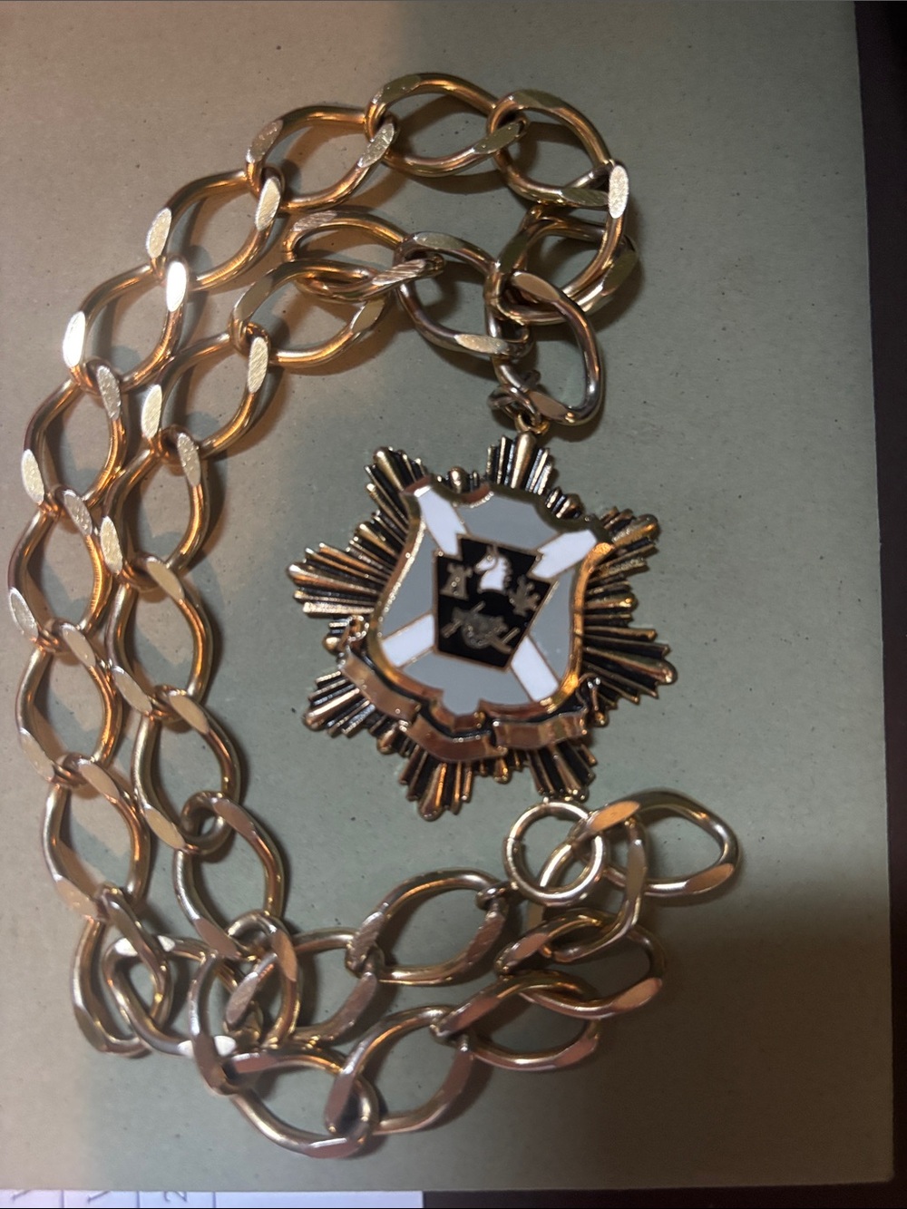 Gold-Tone Chain necklace with Black & White Crest Pendant